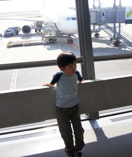 飛行機で出発.jpg